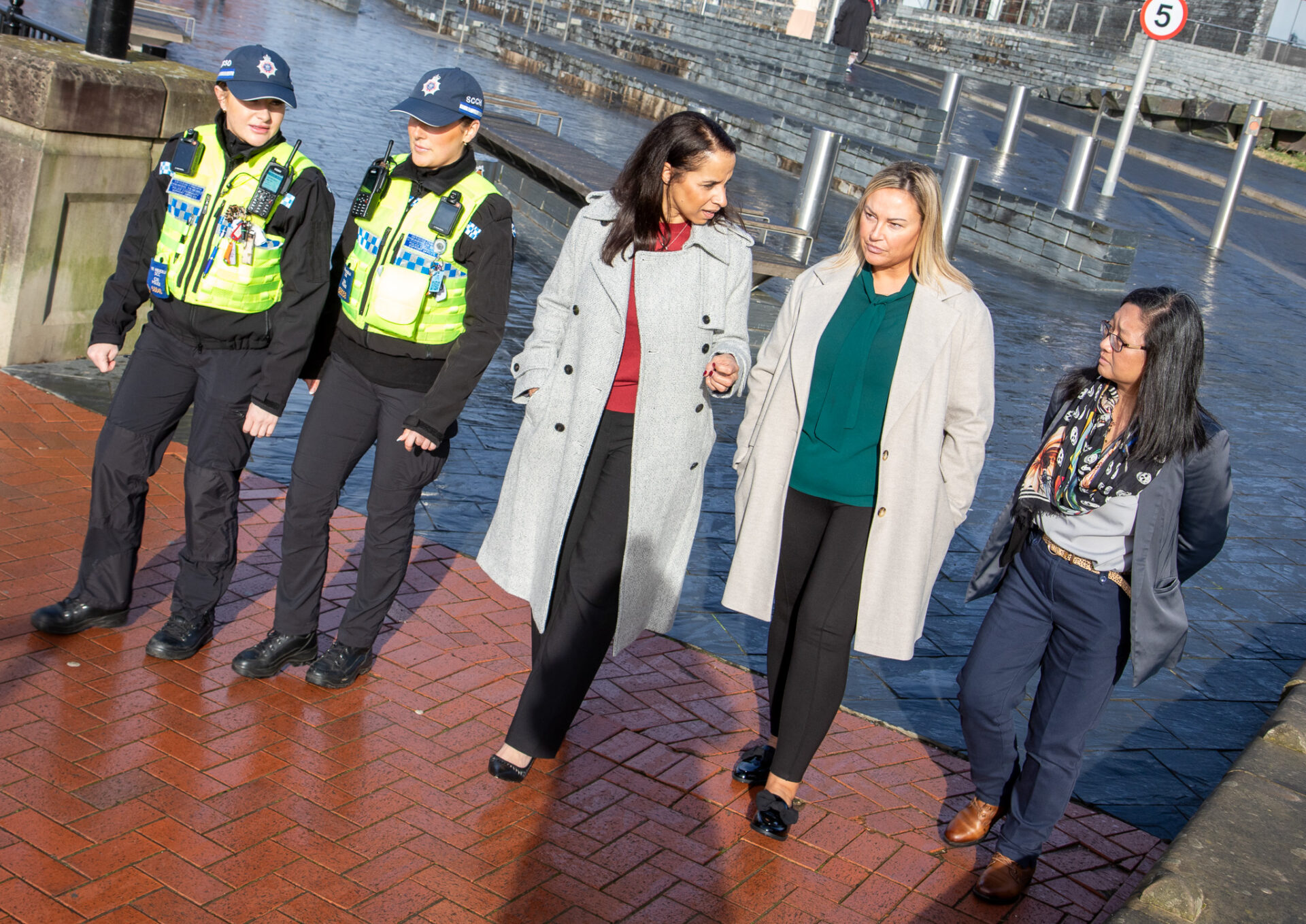 Picture of Commissioner Emma Wools with PCSos and residents in Cardiff Bay