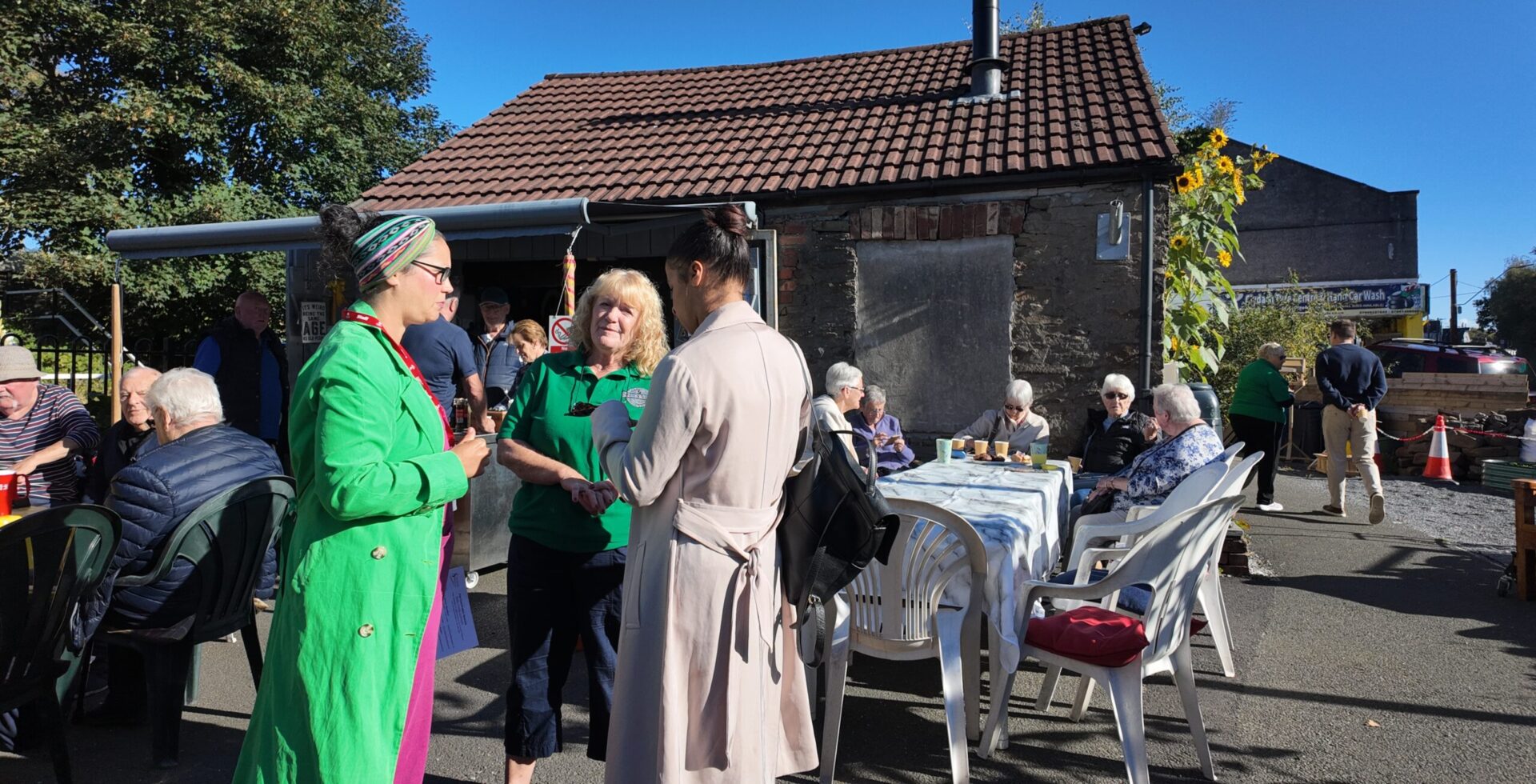 Emma speaking with members of Men's Shed, Clydach