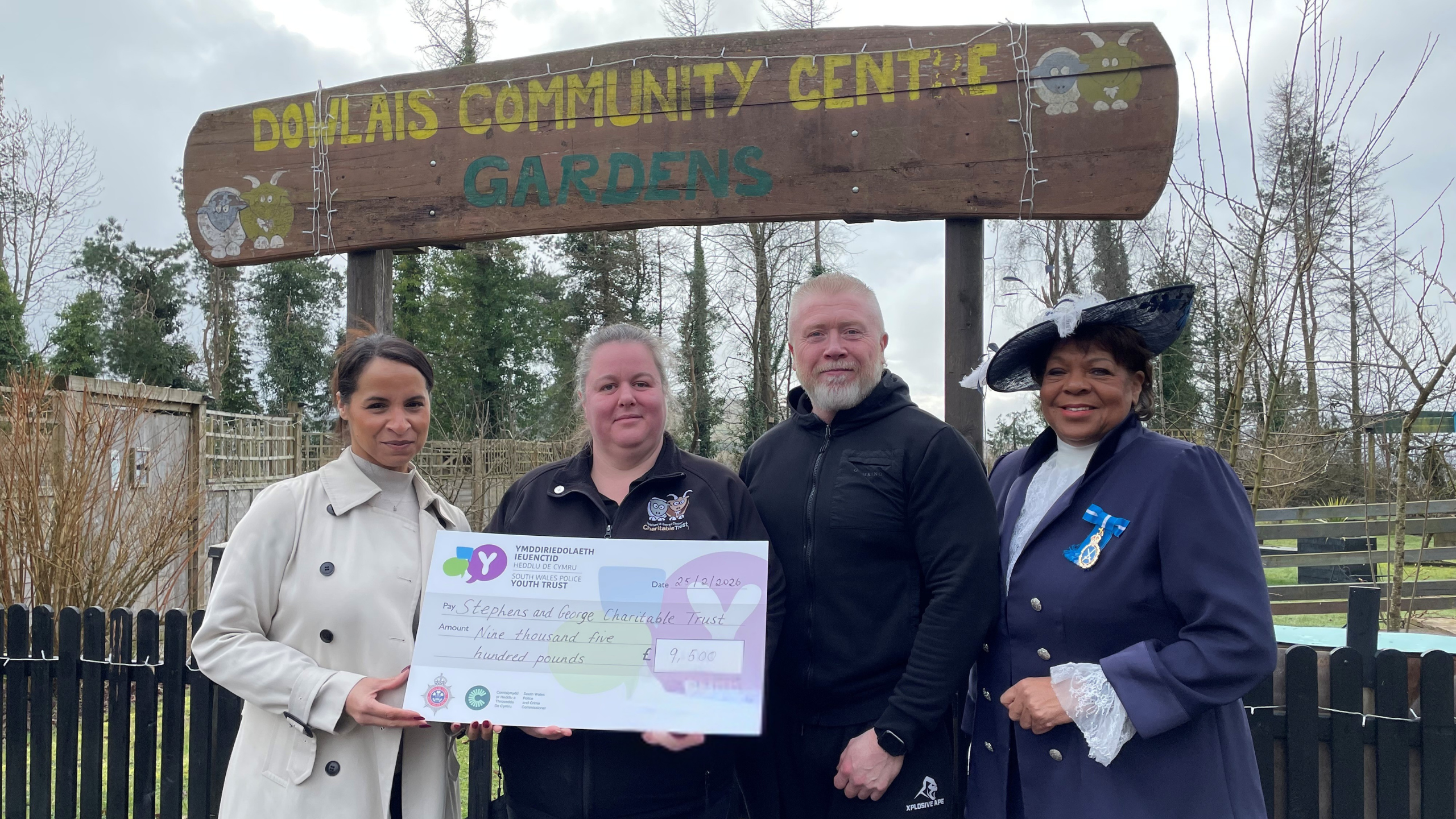 Picture of the Police & crime Commissioner presenting a cheque to Dowlais Community Centre